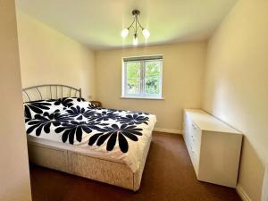 Una cama o camas en una habitación de The Rehoboth Place