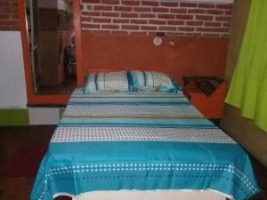 Ένα ή περισσότερα κρεβάτια σε δωμάτιο στο My Green House