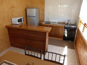 Kuchyň nebo kuchyňský kout v ubytování Agroturismo Coñico + 28 fotografií