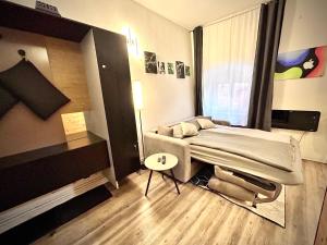 Postel nebo postele na pokoji v ubytování K&H Apartman