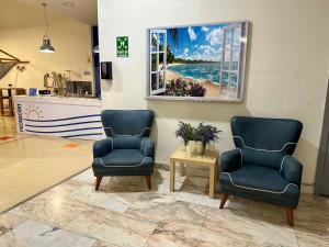 Zona de estar de Apartamentos Turisticos Mediterraneo