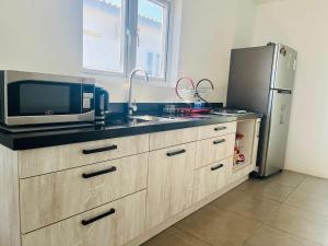 Kuchyň nebo kuchyňský kout v ubytování Cayenne home