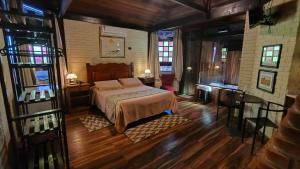 Cama ou camas em um quarto em Hotel da Cachoeira