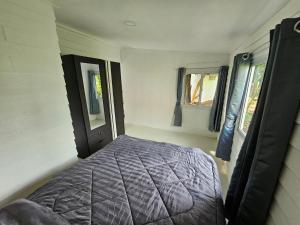 Postel nebo postele na pokoji v ubytování Baan Nok Koh Chang