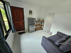 Kuchyň nebo kuchyňský kout v ubytování Baan Nok Koh Chang