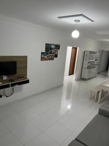 TV/trung tâm giải trí tại Oásis do Prado, casa de temporada