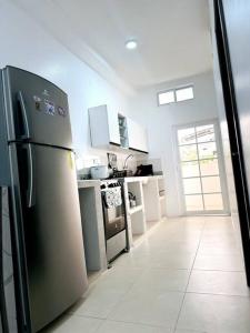 Kuchyň nebo kuchyňský kout v ubytování Bahía Mann Suite 03