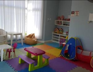 Dětský klub v ubytování Casa no Pacific Residence Club - condomínio com Piscina e Lazer