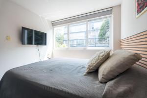 Televisor o centre d'entreteniment de nice apt. Roma CDMX :)