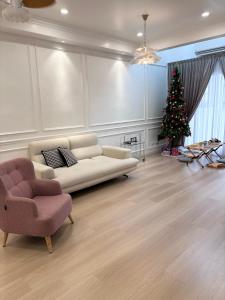 French Style Comfy Homestay Alor Setar 现代极简法式温馨民宿的休息区