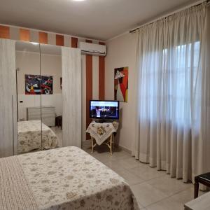Кровать или кровати в номере Villa Annamaria