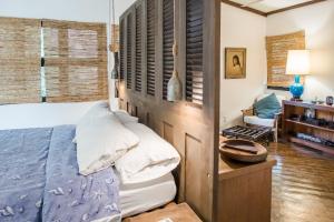 Voodi või voodid majutusasutuse TUKI Nest Spacious Home with Garden View & Self-Service Breakfast - Large Porch, Subic Monkeys, Pet Friendly with a Fee toas