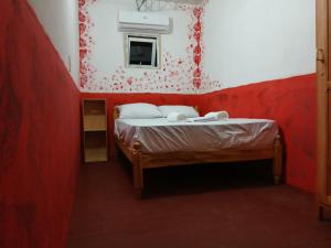 Una cama o camas en una habitación de Casa mosaico