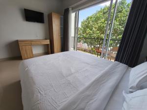 Ein Bett oder Betten in einem Zimmer der Unterkunft Lushy Hostel Nusa Penida