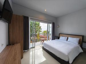 Ein Bett oder Betten in einem Zimmer der Unterkunft Lushy Hostel Nusa Penida