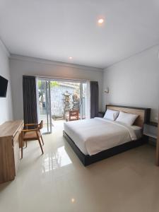 Ein Bett oder Betten in einem Zimmer der Unterkunft Lushy Hostel Nusa Penida