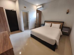Ein Bett oder Betten in einem Zimmer der Unterkunft Lushy Hostel Nusa Penida
