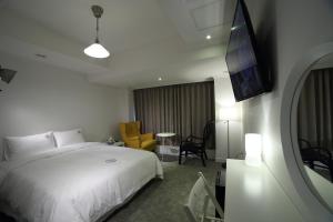TV a/nebo společenská místnost v ubytování Hillside Hotel