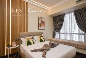 Postel nebo postele na pokoji v ubytování R&F Princess Cove by Nest Home at Johor Bahru