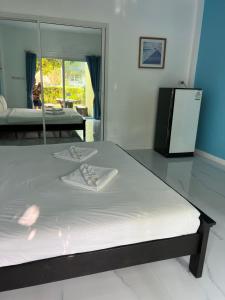 Postel nebo postele na pokoji v ubytování Thipburee Resort