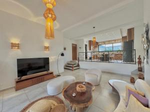 Μια τηλεόραση ή/και κέντρο ψυχαγωγίας στο Villa Cas' Ylang Nosy Be