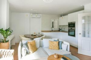 Kuchyň nebo kuchyňský kout v ubytování Moderno piso a un paso de la playa