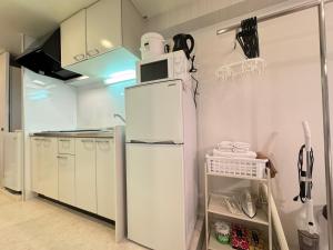 Kuchyň nebo kuchyňský kout v ubytování マルチステイ大阪天満