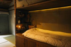 Voodi või voodid majutusasutuse 尾道土堂庵 Onomichi TSUCHIDOAN supported by COCOSTAY toas