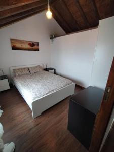 Ένα ή περισσότερα κρεβάτια σε δωμάτιο στο Casa El Sauzal