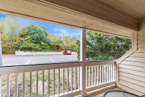 a balcony with a view of a parking lot at Grand Wood Suites - 3rd Floor Back Side Penthouse Suite 307 in Nashville