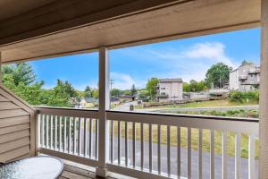 a balcony with a view of a street at Grand Wood Suites - 3rd Floor Front Side Penthouse Suite 303 in Nashville