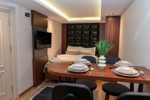 Μια τηλεόραση ή/και κέντρο ψυχαγωγίας στο THE MUA LUXURY HOMEs