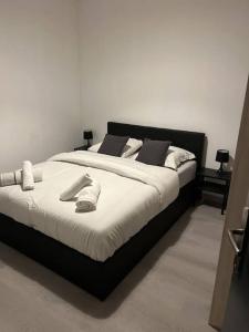 Ένα ή περισσότερα κρεβάτια σε δωμάτιο στο Appartement Brest Kerinou avec box internet