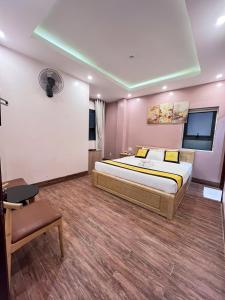 Postel nebo postele na pokoji v ubytování Hoàng Gia Hotel Côn Đảo