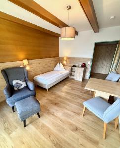 Postel nebo postele na pokoji v ubytování Haus Friedrichsburg - Bergbahnen von Mai bis November inklusive