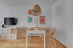TV a/nebo společenská místnost v ubytování Piccolo Mare by Grand Apartments