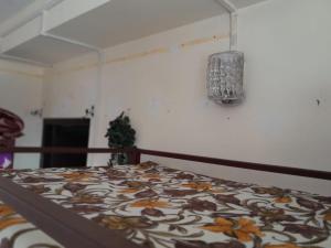Postel nebo postele na pokoji v ubytování Backpackers Hostel