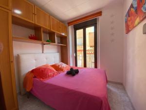 Postel nebo postele na pokoji v ubytování Apartaments Portbou Costa Brava