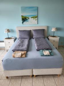 Ένα ή περισσότερα κρεβάτια σε δωμάτιο στο Studio with sea view and panoramic view in Bredene
