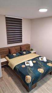 Postel nebo postele na pokoji v ubytování Apartments Green Beograd