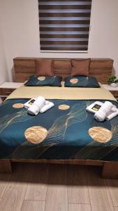 Postel nebo postele na pokoji v ubytování Apartments Green Beograd + 37 fotografií