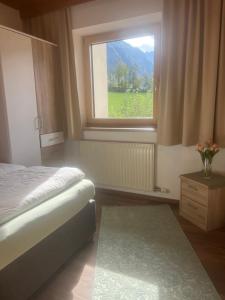 Postel nebo postele na pokoji v ubytování Apart Bergblick
