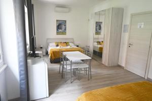 A bed or beds in a room at Appia Antica Guest House