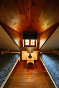 Postel nebo postele na pokoji v ubytování Cottage du vieux chêne