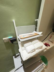 Postel nebo postele na pokoji v ubytování 羅東沐石
