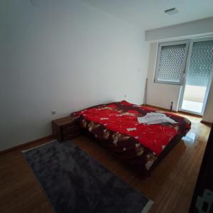 Postel nebo postele na pokoji v ubytování Apartment Vuchkovi