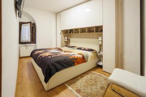 Кровать или кровати в номере La Casa di Nonna Lina