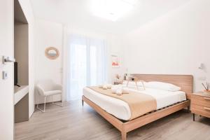 Ένα ή περισσότερα κρεβάτια σε δωμάτιο στο Easylife - Apartment with Terrace and Comfort