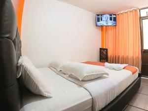 Postel nebo postele na pokoji v ubytování Hostal Anais