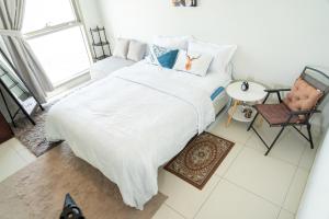 Postel nebo postele na pokoji v ubytování Upscale 2BR apartment with a complete view of the sea on Al Reem Island + 37 fotografií